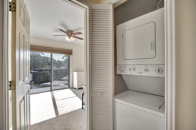 9003 Gaylord St Unit 12, Houston, TX 77024 - laundry area featuring stacked washer / drying machine, carpet, and a ceiling fan