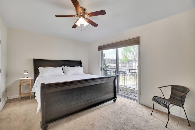 9003 Gaylord St Unit 12, Houston, TX 77024 - bedroom with access to outside, light carpet, and a ceiling fan