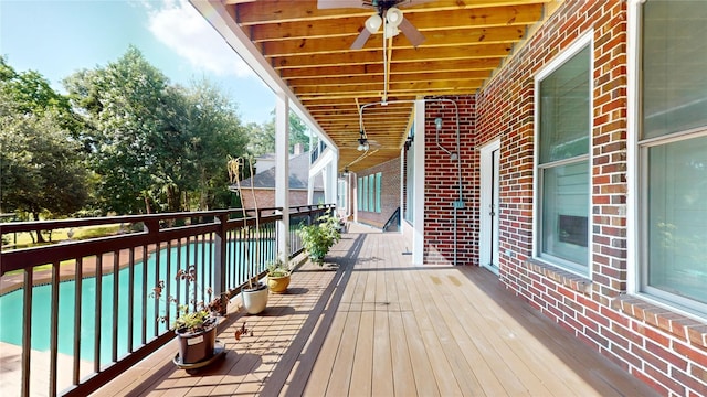 24615 W Kingscrest Cir, Spring, TX 77389 - wooden terrace with a ceiling fan