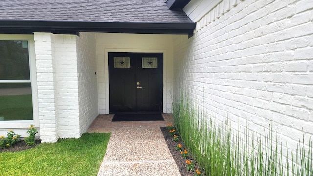 6658 Radley Dr, Spring, TX 77379 - doorway to property with roof with shingles