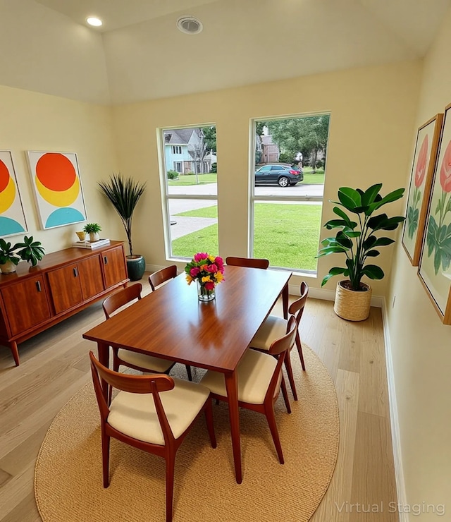 6658 Radley Dr, Spring, TX 77379 - dining space featuring light wood-style floors, healthy amount of natural light, and recessed lighting