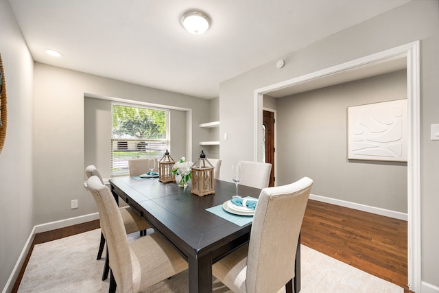 10718 Dunlap St, Houston, TX 77096 - dining room featuring wood finished floors and baseboards