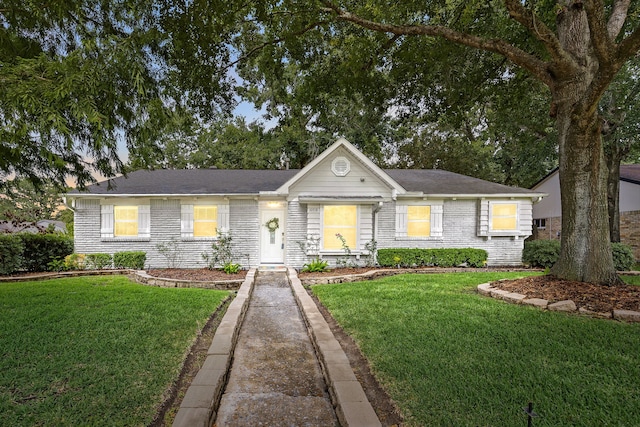 10718 Dunlap St, Houston, TX 77096 - ranch-style home featuring a front yard