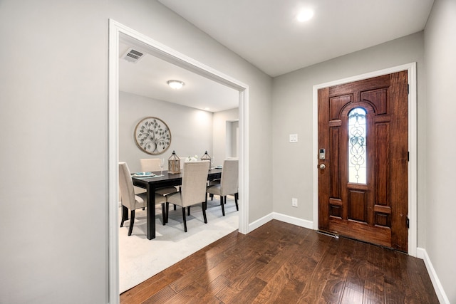 10718 Dunlap St, Houston, TX 77096 - entryway featuring dark wood-style flooring and baseboards