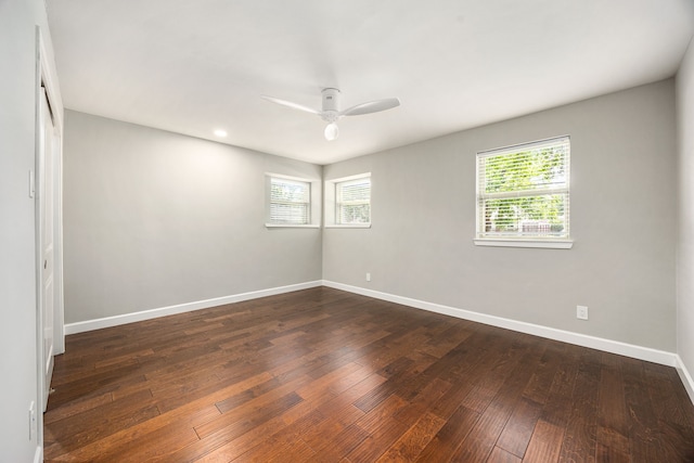 10718 Dunlap St, Houston, TX 77096 - empty room with ceiling fan, baseboards, dark wood-type flooring, and recessed lighting
