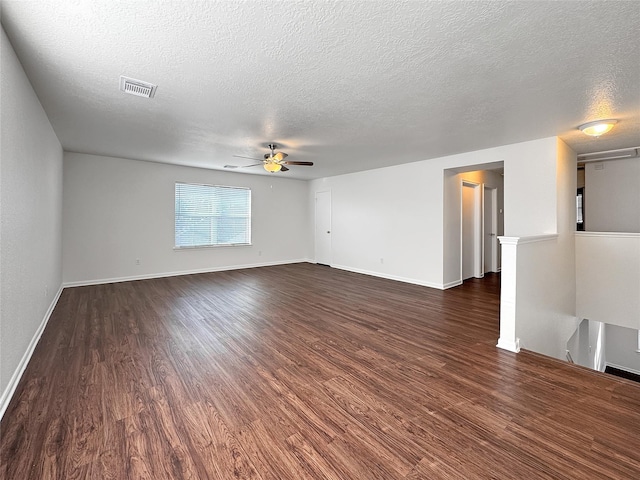 15507 Liberty Bluff Dr, Houston, TX 77049 - unfurnished room featuring a textured ceiling, ceiling fan, and dark wood-type flooring