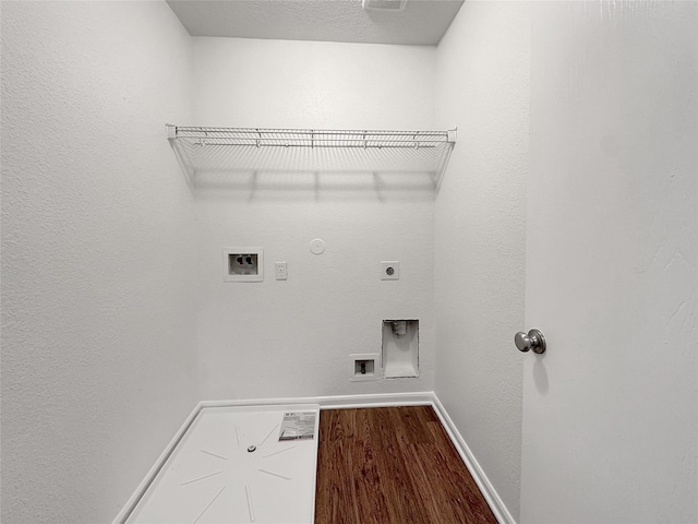 15507 Liberty Bluff Dr, Houston, TX 77049 - washroom featuring hookup for a gas dryer, hookup for an electric dryer, washer hookup, and wood finished floors