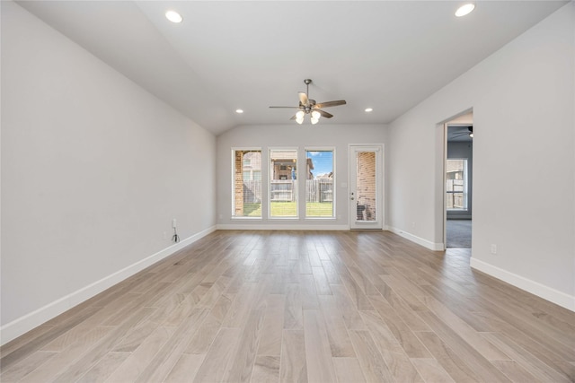 15711 Autumn Sun Ct, Conroe, TX 77302 - unfurnished living room with ceiling fan, recessed lighting, light wood-type flooring, and baseboards