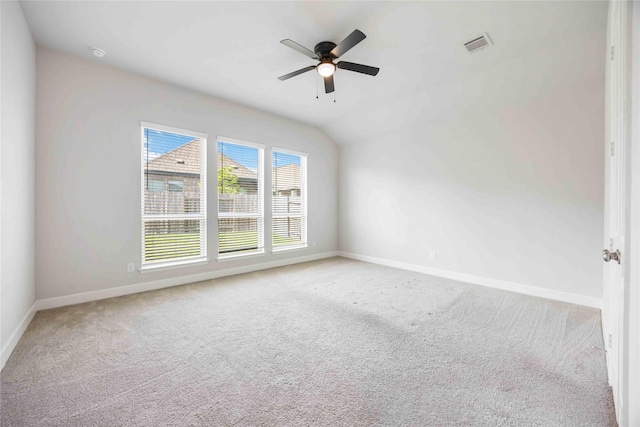 15711 Autumn Sun Ct, Conroe, TX 77302 - carpeted empty room featuring baseboards, ceiling fan, lofted ceiling, and a smoke detector
