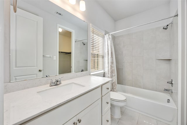 15711 Autumn Sun Ct, Conroe, TX 77302 - full bath featuring vanity, shower / bath combo, tile patterned flooring, and toilet
