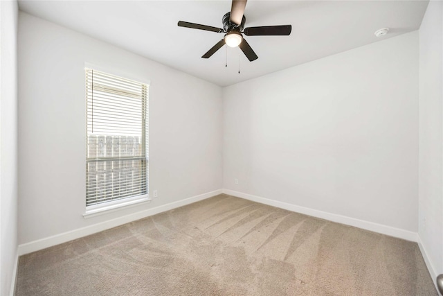 15711 Autumn Sun Ct, Conroe, TX 77302 - spare room with carpet, baseboards, and a smoke detector