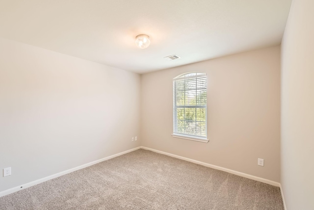7607 Friesian Meadow Ln, Humble, TX 77338 - carpeted spare room featuring baseboards