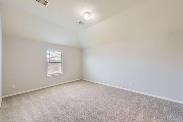 7607 Friesian Meadow Ln, Humble, TX 77338 - empty room featuring carpet floors, baseboards, and lofted ceiling