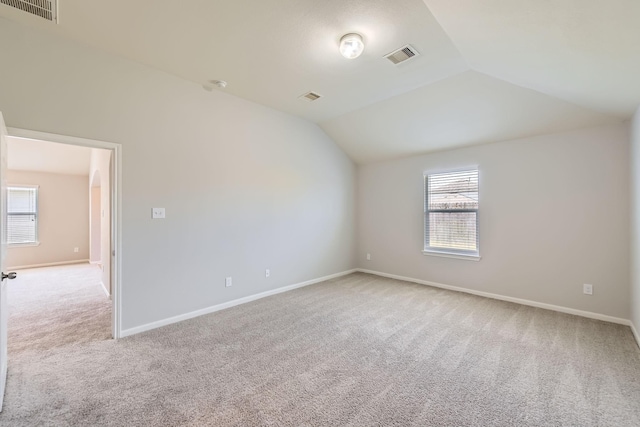7607 Friesian Meadow Ln, Humble, TX 77338 - bonus room featuring carpet flooring, vaulted ceiling, and baseboards
