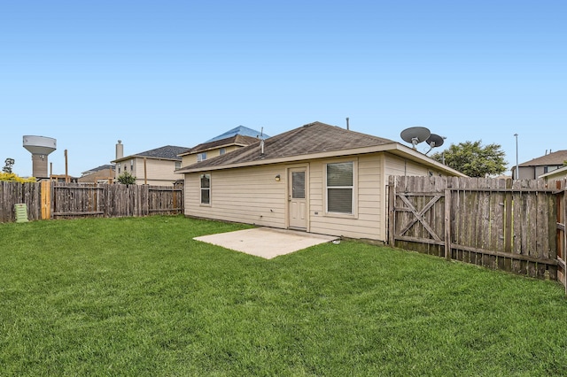 7607 Friesian Meadow Ln, Humble, TX 77338 - rear view of house featuring a patio and roof with shingles