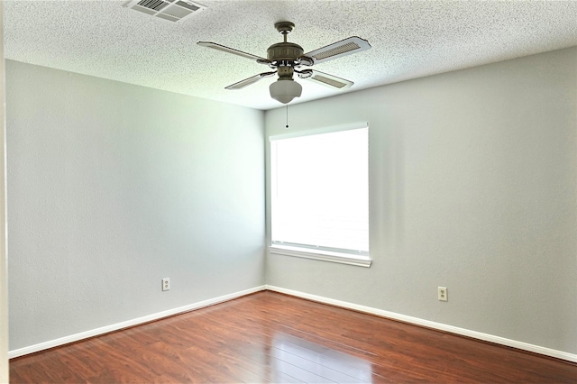 3114 Hollow Creek Ct, Houston, TX 77082 - empty room with wood finished floors, a ceiling fan, baseboards, and a textured ceiling