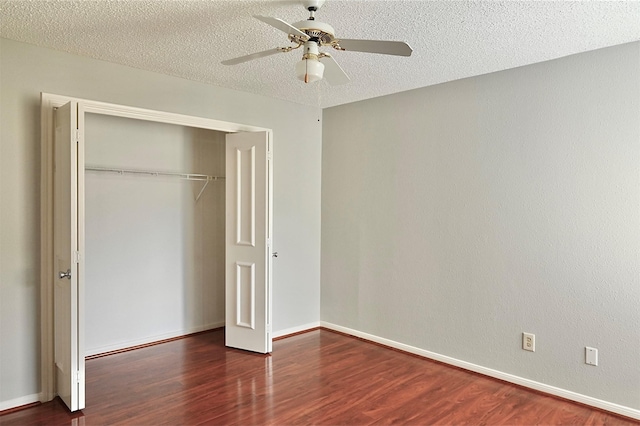 3114 Hollow Creek Ct, Houston, TX 77082 - unfurnished bedroom with wood finished floors, a closet, a textured ceiling, baseboards, and ceiling fan
