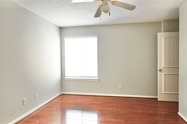 3114 Hollow Creek Ct, Houston, TX 77082 - spare room with wood finished floors, a ceiling fan, a textured ceiling, and baseboards