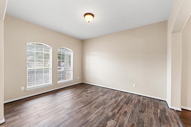 406 Oak Stream Dr, Conroe, TX 77304 - empty room featuring dark wood-style flooring and baseboards