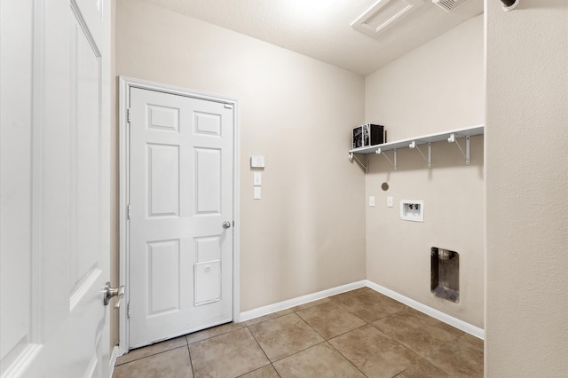406 Oak Stream Dr, Conroe, TX 77304 - washroom featuring hookup for a washing machine, light tile patterned floors, and baseboards