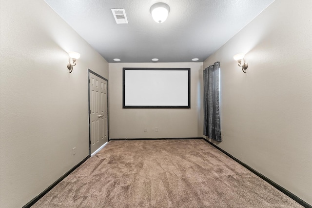 406 Oak Stream Dr, Conroe, TX 77304 - home theater room featuring carpet flooring and baseboards