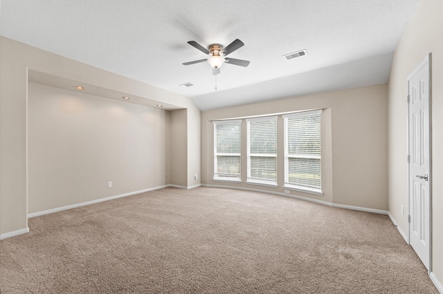 406 Oak Stream Dr, Conroe, TX 77304 - spare room featuring carpet floors, ceiling fan, and baseboards