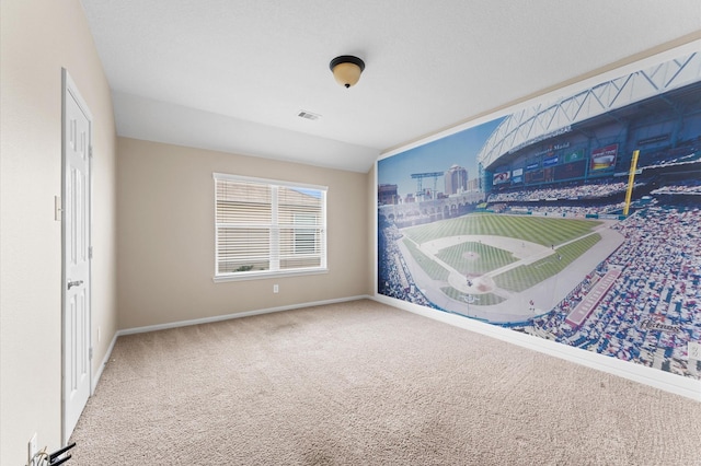 406 Oak Stream Dr, Conroe, TX 77304 - unfurnished bedroom with carpet floors and baseboards