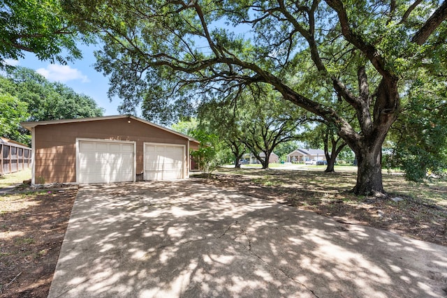 917 Alvin St, Pasadena, TX 77506 - view of home's exterior featuring an outbuilding and a garage