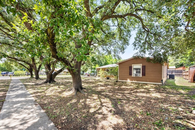 917 Alvin St, Pasadena, TX 77506 - view of side of property featuring central air condition unit and cooling unit