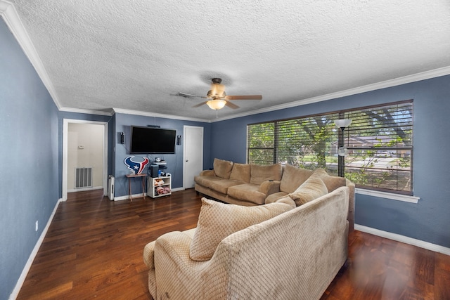 917 Alvin St, Pasadena, TX 77506 - living room featuring a ceiling fan, wood finished floors, baseboards, crown molding, and a textured ceiling
