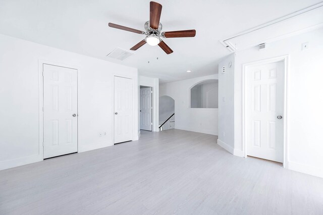 24034 River Place Dr, Katy, TX 77494 - unfurnished living room featuring attic access, ceiling fan, and light wood finished floors