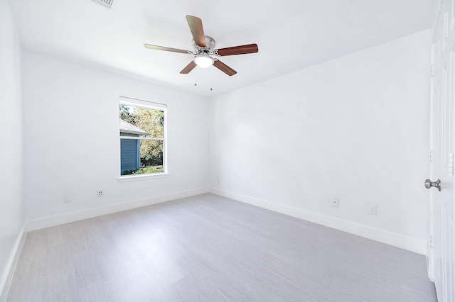 24034 River Place Dr, Katy, TX 77494 - empty room with wood finished floors, baseboards, and ceiling fan