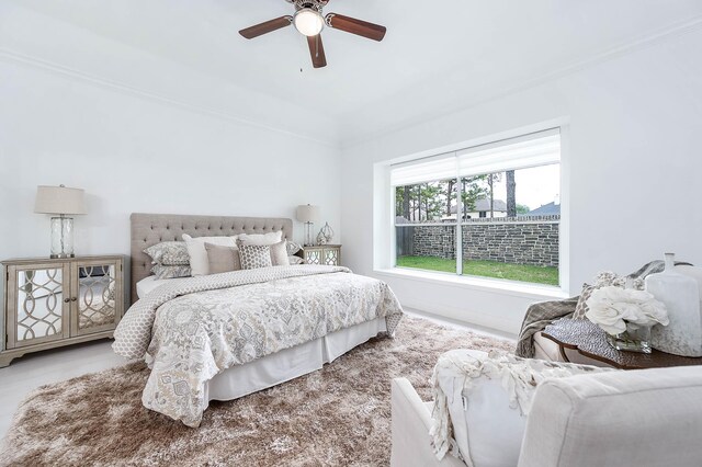 24034 River Place Dr, Katy, TX 77494 - bedroom with crown molding and a ceiling fan