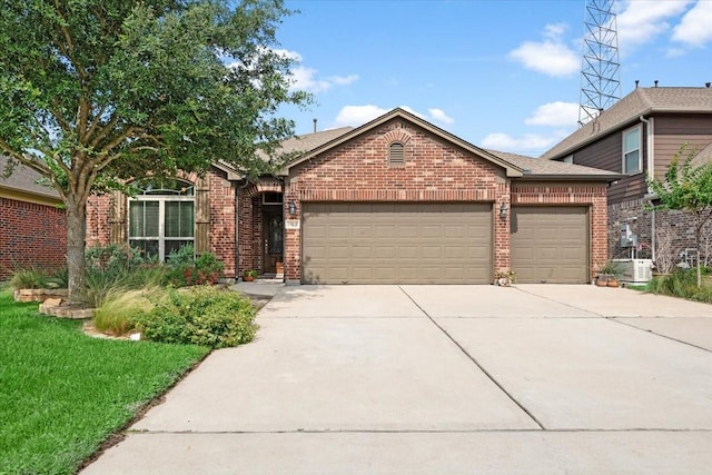 15031 Appian Oak St, Cypress, TX 77429 - view of front facade featuring brick siding, concrete driveway, and a garage