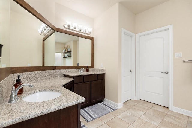 15031 Appian Oak St, Cypress, TX 77429 - full bathroom featuring baseboards and double vanity