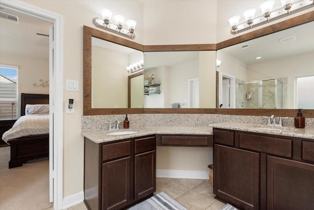 15031 Appian Oak St, Cypress, TX 77429 - bathroom featuring double vanity, a shower stall, and connected bathroom