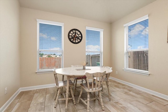 15031 Appian Oak St, Cypress, TX 77429 - dining space with healthy amount of natural light and baseboards