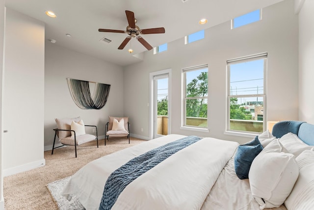 111 E 2nd St, Houston, TX 77007 - bedroom with multiple windows, carpet floors, baseboards, a ceiling fan, and recessed lighting
