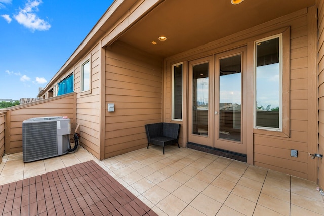 111 E 2nd St, Houston, TX 77007 - view of patio / terrace featuring central AC and french doors