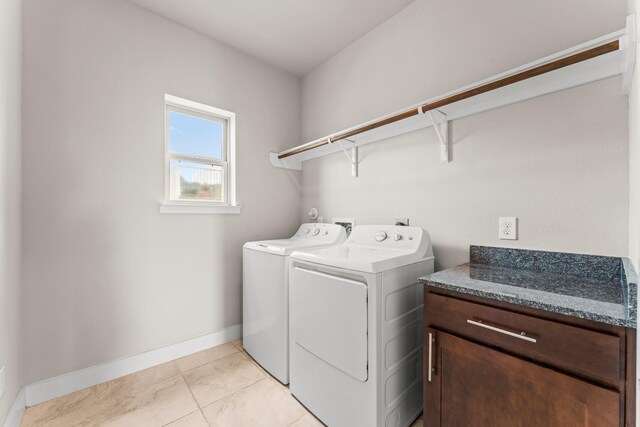 111 E 2nd St, Houston, TX 77007 - washroom with washer and dryer, baseboards, and light tile patterned floors