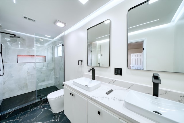 16538 Park Scot Dr, Houston, TX 77084 - full bathroom with toilet, a marble finish shower, marble finish flooring, and double vanity
