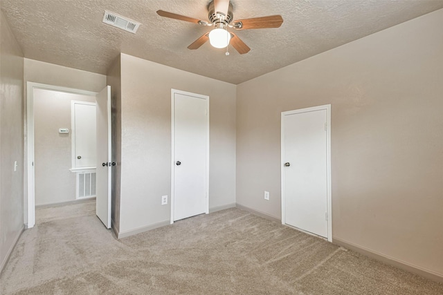 16538 Park Scot Dr, Houston, TX 77084 - unfurnished bedroom featuring a textured ceiling, carpet flooring, baseboards, and ceiling fan