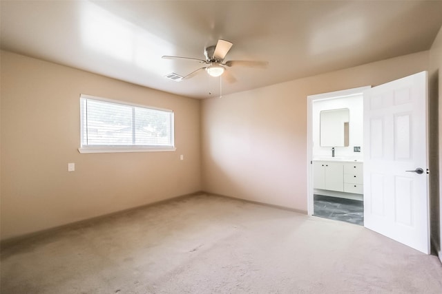 16538 Park Scot Dr, Houston, TX 77084 - unfurnished bedroom featuring carpet flooring, ensuite bathroom, and a ceiling fan