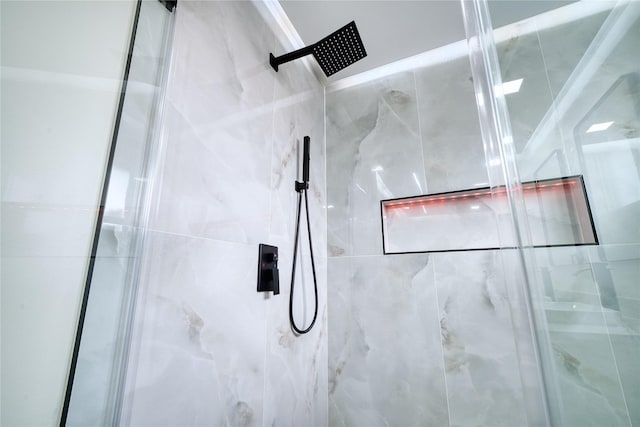 16538 Park Scot Dr, Houston, TX 77084 - bathroom featuring a marble finish shower