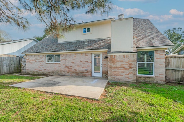 16538 Park Scot Dr, Houston, TX 77084 - back of house featuring a patio, brick siding, and roof with shingles
