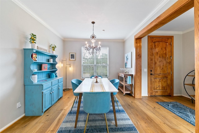 1538 Bevis St, Houston, TX 77008 - dining room featuring a chandelier, light wood finished floors, baseboards, and crown molding