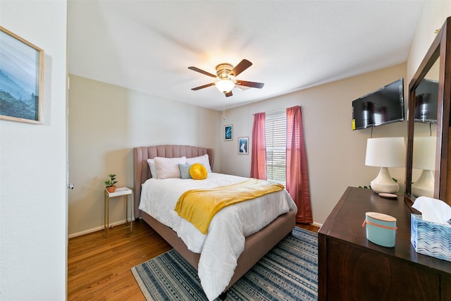 1538 Bevis St, Houston, TX 77008 - bedroom with wood finished floors, a ceiling fan, and baseboards