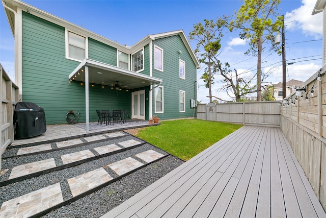 1538 Bevis St, Houston, TX 77008 - rear view of house featuring a ceiling fan, a patio, and a wooden deck