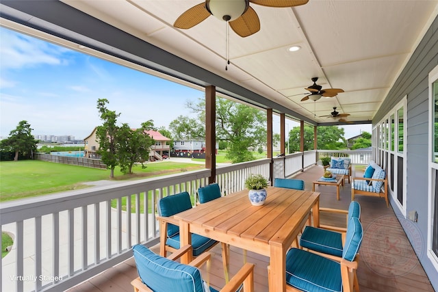 610 S Shady Ln, Shoreacres, TX 77571 - deck featuring a ceiling fan, a yard, and outdoor lounge area