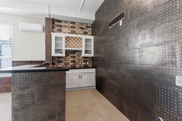 610 S Shady Ln, Shoreacres, TX 77571 - community bar area featuring a wall mounted air conditioner, light tile patterned flooring, and backsplash